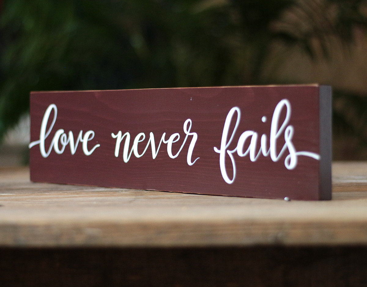 Love Never Fails Sign - The Weed Patch